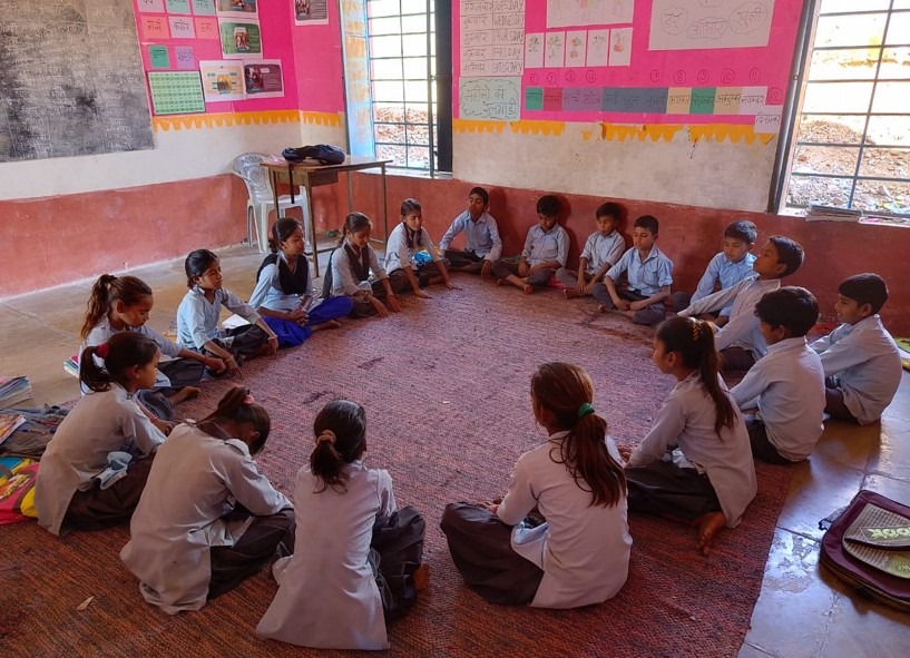 Children sitting in a circle